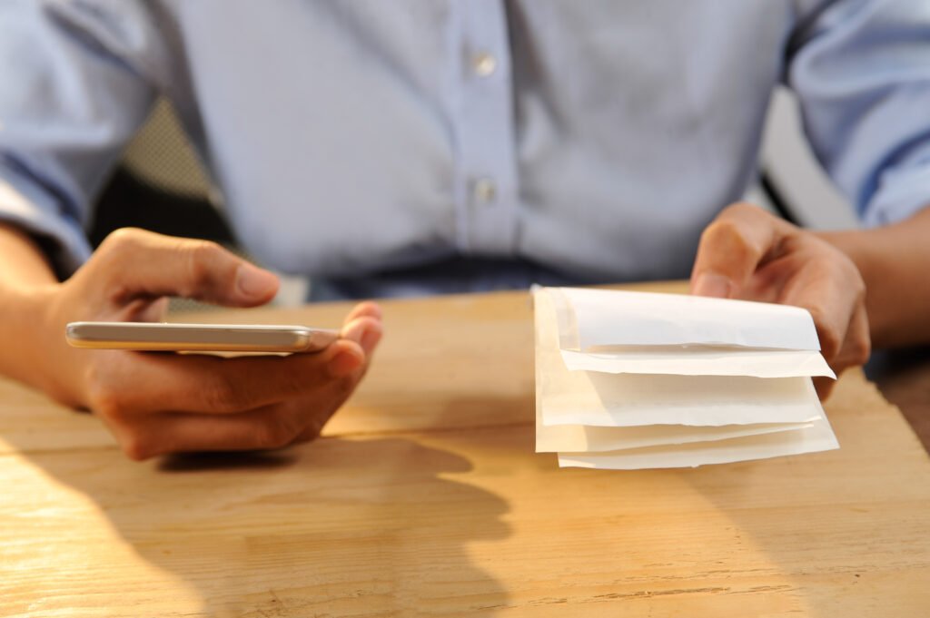 a man calculating their bill